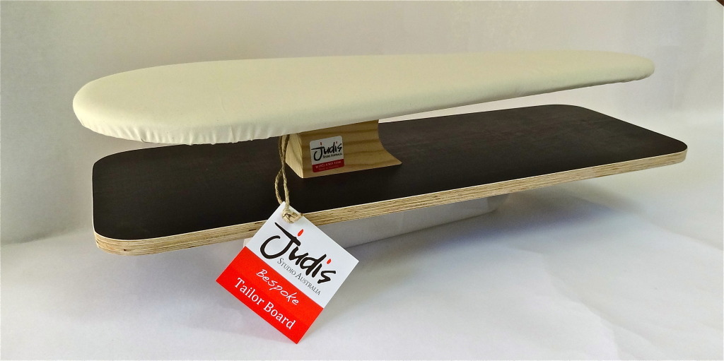 Bespoke large Tailor board has a sealed MDF base to prevent warping in a steamy environment. top board is pine with higher density 6mm foam and heavy duty calico cover.